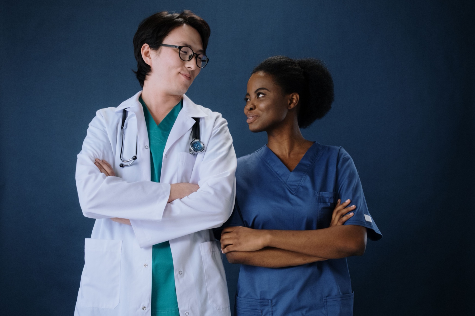 Two confident clinicians standing together, ready for what comes next
